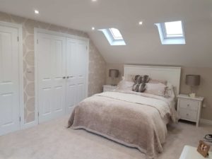 loft conversion bedroom with roof sunlights