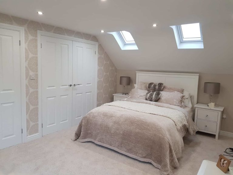 loft conversion bedroom with roof sunlights