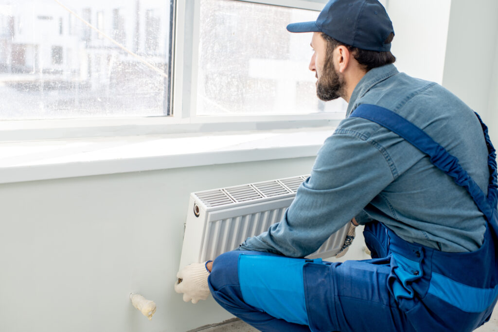 workman fitting radiator 
