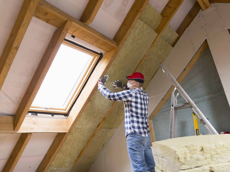 man securing loft conversion window